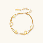Dainty gold-plated bracelet with star and clover charms on double chain with adjustable extender